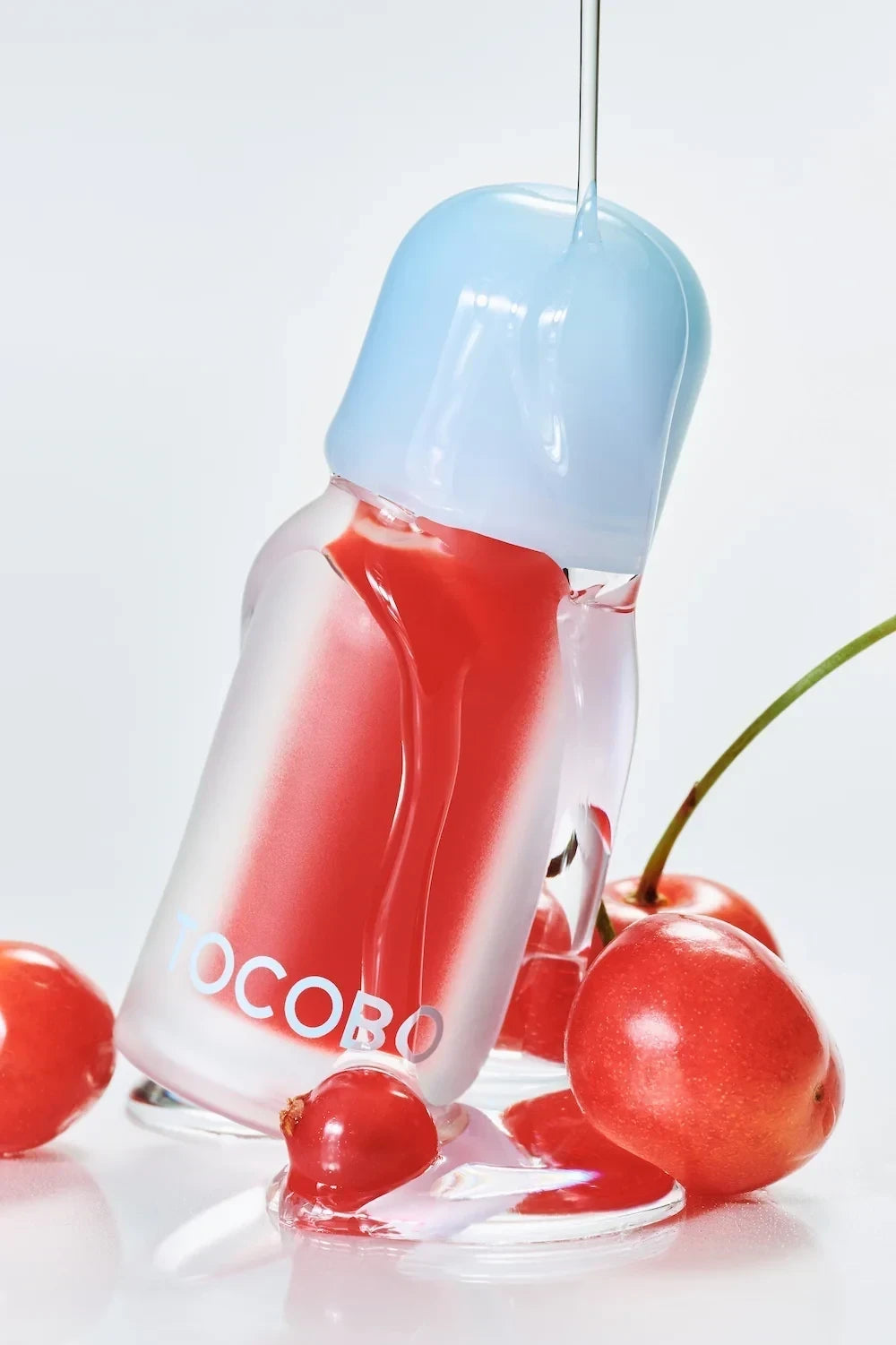 JUICY BERRY PLUMPING LIP OIL 12 CHERRY ADE -Tocobo